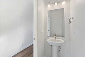 Bathroom featuring hardwood / wood-style floors