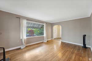 Unfurnished room with wood-type flooring