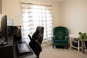 View of carpeted home office