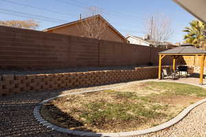 View of yard with a gazebo and a patio