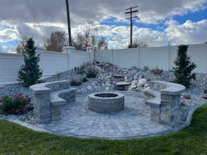 View of patio featuring a fire pit