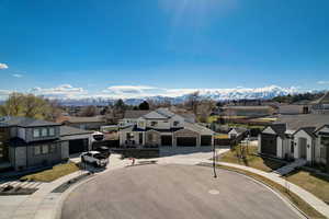 Birds eye view of property with a mountain view