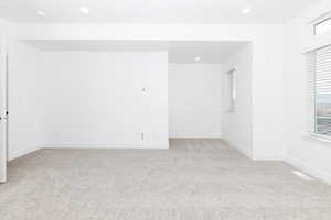 View of carpeted spare room