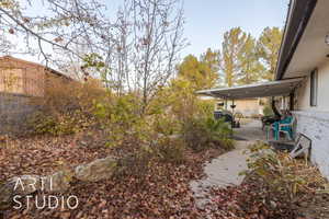 View of yard with a patio area