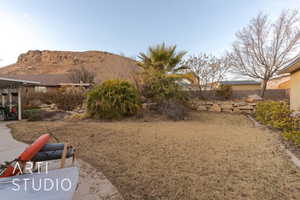 View of yard with a mountain view