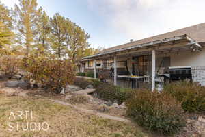 View of yard with a patio