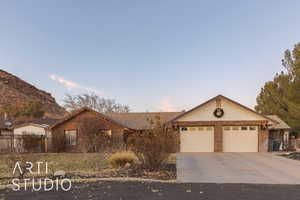 Ranch-style home with a garage