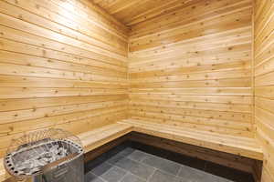 View of sauna / steam room with tile patterned flooring