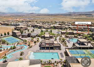 Birds eye view of property featuring a mountain view