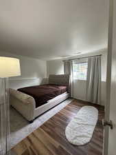 Bedroom featuring hardwood / wood-style flooring