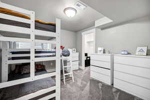 View of carpeted bedroom