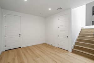 Unfurnished room featuring light hardwood / wood-style flooring