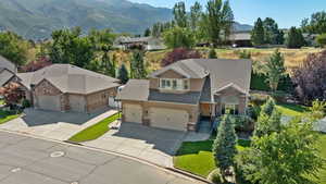 Exterior space with a mountain view and a garage