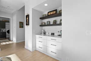 Bar with built-in cabinets and drawers for storage