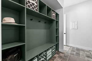 View of mudroom with plenty of built-in storage