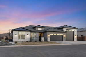 View of front of property with a garages