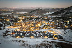 Snowy aerial view with a mountain view