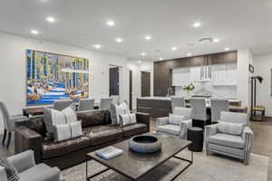 Living room featuring light hardwood / wood-style floors and sink