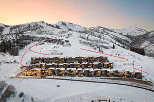 Snowy aerial view with a mountain view