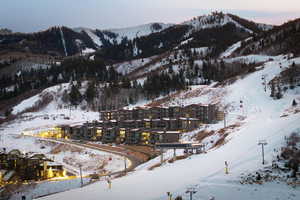 Snowy aerial view with a mountain view