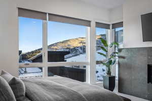 Bedroom with multiple windows