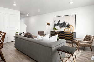 Living room featuring light hardwood / wood-style flooring