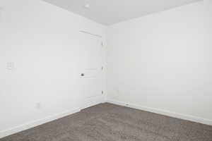 Spare room with carpet flooring