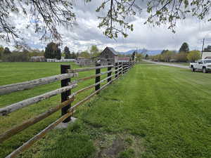 View of yard featuring a mountain view and a rural view