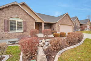 Single story home featuring a garage