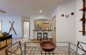 Dining space with light hardwood / wood-style flooring