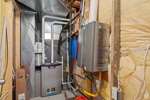 Utility room with tankless water heater