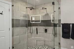 Bathroom featuring walk in shower