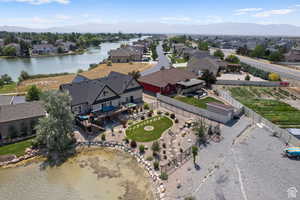 Aerial view featuring a water and mountain view