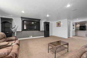 Living room with carpet floors