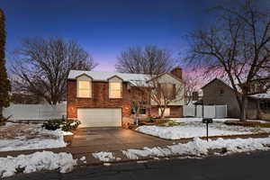 View of front of house with a garage