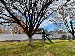 View of yard with a playground