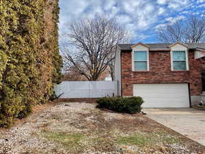 View of home's exterior with a garage