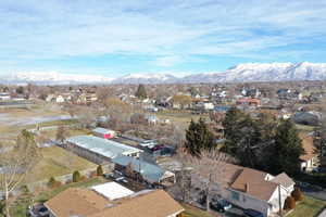 Drone / aerial view featuring a mountain view