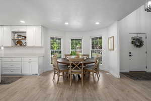 Dining area featuring light hardwood / wood-style floors