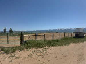 View of yard with a mountain view and a rural view