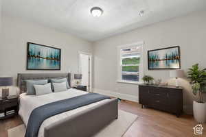 Bedroom featuring light wood-type flooring