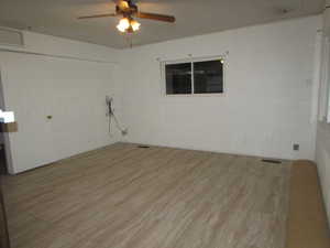 Apartment - Living room featuring ceiling fan