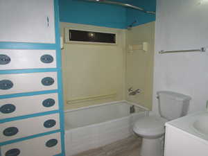 Apartment - Full bathroom featuring shower / bathing tub combination, vanity, and toilet