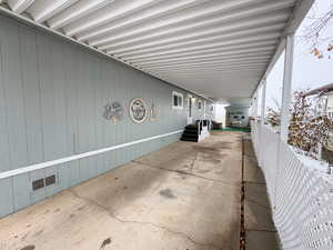 View of patio featuring a carport