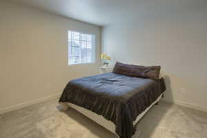 Bedroom featuring carpet flooring