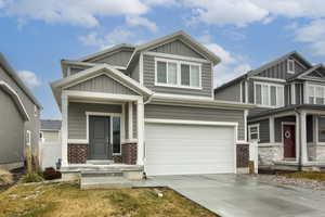 Craftsman house with a garage