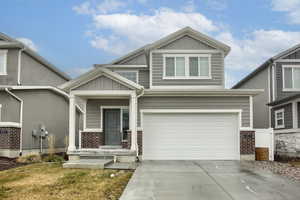 View of front of home featuring a garage