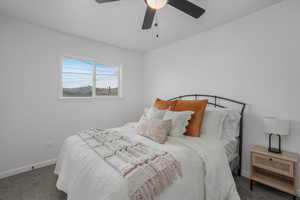Main Bedroom Carpeted bedroom with ceiling fan