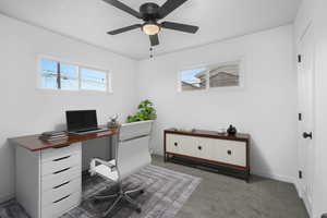 Bedroom # 3 Carpeted office with ceiling fan. Virtual Staged.
