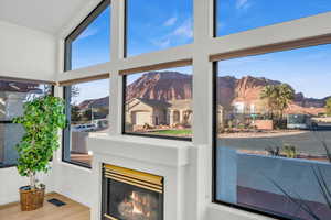 Room details with a mountain view and hardwood / wood-style flooring